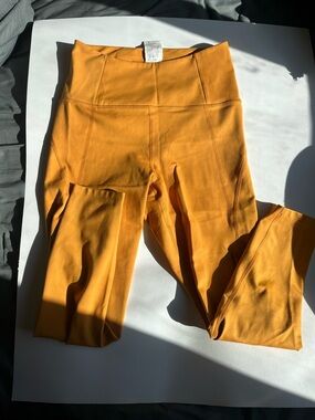girlfriend collective High-Waist Leggings in Mustard
